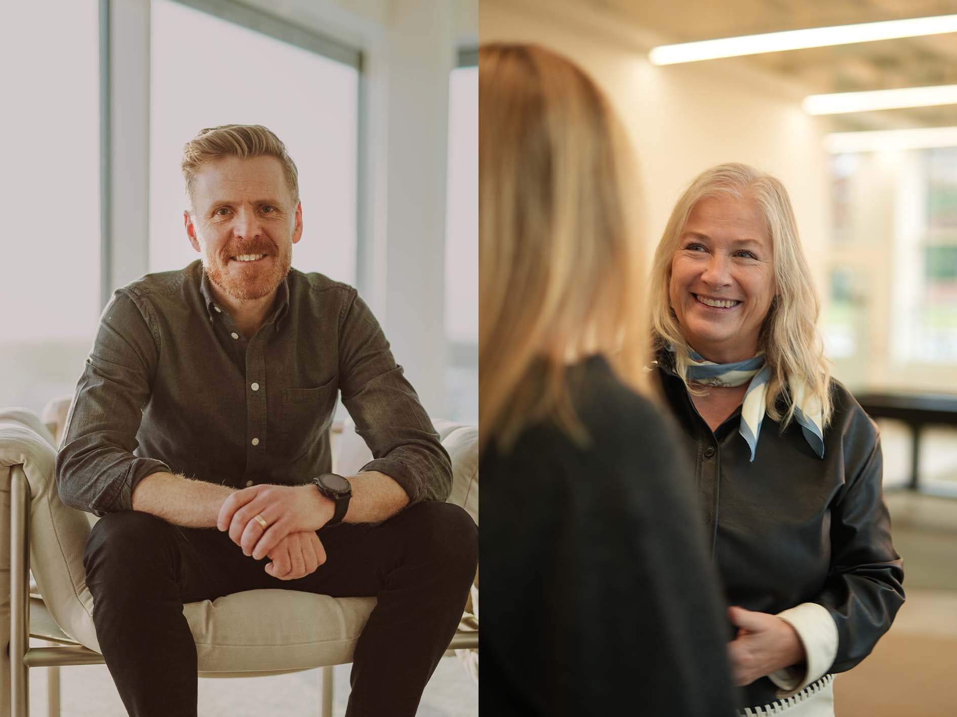 A man sitting and smiling at the camera on the left; a woman smiling in conversation with another person on the right.